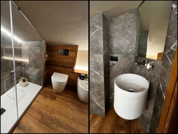 Bagno su misura dal fascino alpino, elegante e accogliente.